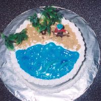 Fishing At The Lake This was a birthday cake for a friend who can't ever get off the lake. It is a 10 inch round with bc icing. Water is piping gel died...