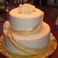 Wedding Cake This is another dummy cake for a bridal expo. Covered in fondant, with gumpaste decorations. Thanks for all the inspiration from all the...