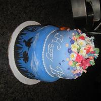 Hummingbird Inspired 50Th B'day Cake For my moms 50th birthday I made her this cake. the bottom tier was covered in fondant, with hand cut outs of grass, flowers, and...