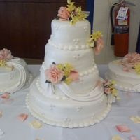 Pearls And Swags This was a practice cake that was donated to the American Red Cross for their Celebrity Dinner. All covered in CBC with fondant swags and...