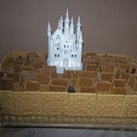 Labyrinth Cake Cake is based on movie, "The Labyrinth". The maze walls are made of fondant and the outer walls are graham crackers. The castle...