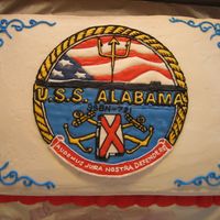 U.s.s. Alabama Emblem Cake The emblem is in color flow ontop of a buttercream iced cake.