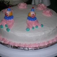 Cake #2 From Wilton Course 1 This is my 2nd cake from wilton course 1. I was just playing around w/the roses and the clowns and all but it looks ok..clowns are kinda...