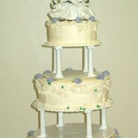 Roses & Sweet Peas This was my brother's wedding cake. We made lavender roses (to match the wedding color), white sweet peas, and the whole thing is...