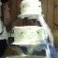 Calla Lily I made this for my sister's wedding. It has whipped cream frosting, articial calla lilies...