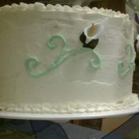 Calla Lily Close Up This is a close up of the artificial calla lilies I inserted into the sides of all three tiers. I then used green whipped cream frosting to...