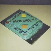 Monopoly Cake The gameboard is cake covered in tinted frosting. All the lines are hand drawn with black icing, and all the property colors were handmixed...