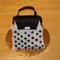 First Purse This is my first attempt at a purse. It didn't turn out quite the way I visualized it in my head, but the 12 year old who received it...