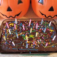 Mom's Birthday Cake This cake was baked by my 19 year old and 22 year old daughters and decorated by my 4 year old son and 3 year old grandson! They did great...