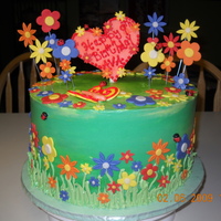 Ava's Garden Cake For my friend's daughter's 9th bday. Covered with SMBC and flowers are from fondant.