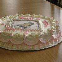 Picture_1653.jpg This cake is a Farewell cake for a coworker who was moving away. it is a 12" round, 1/2 chcolate fudge and chcolate mouse an 1/2...