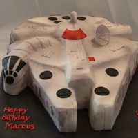 Millennium Falcon My nephew's birthday cake. I had a lot of fun with this one. It is hard to tell in the pic but I sprayed this with Wilton Color Mist...
