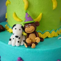 Monkey Dog Cake - The Back Here is the back of the cake. I had a fit making the little monkey - as he dried he began to lean over and then his ear fell off. In the...