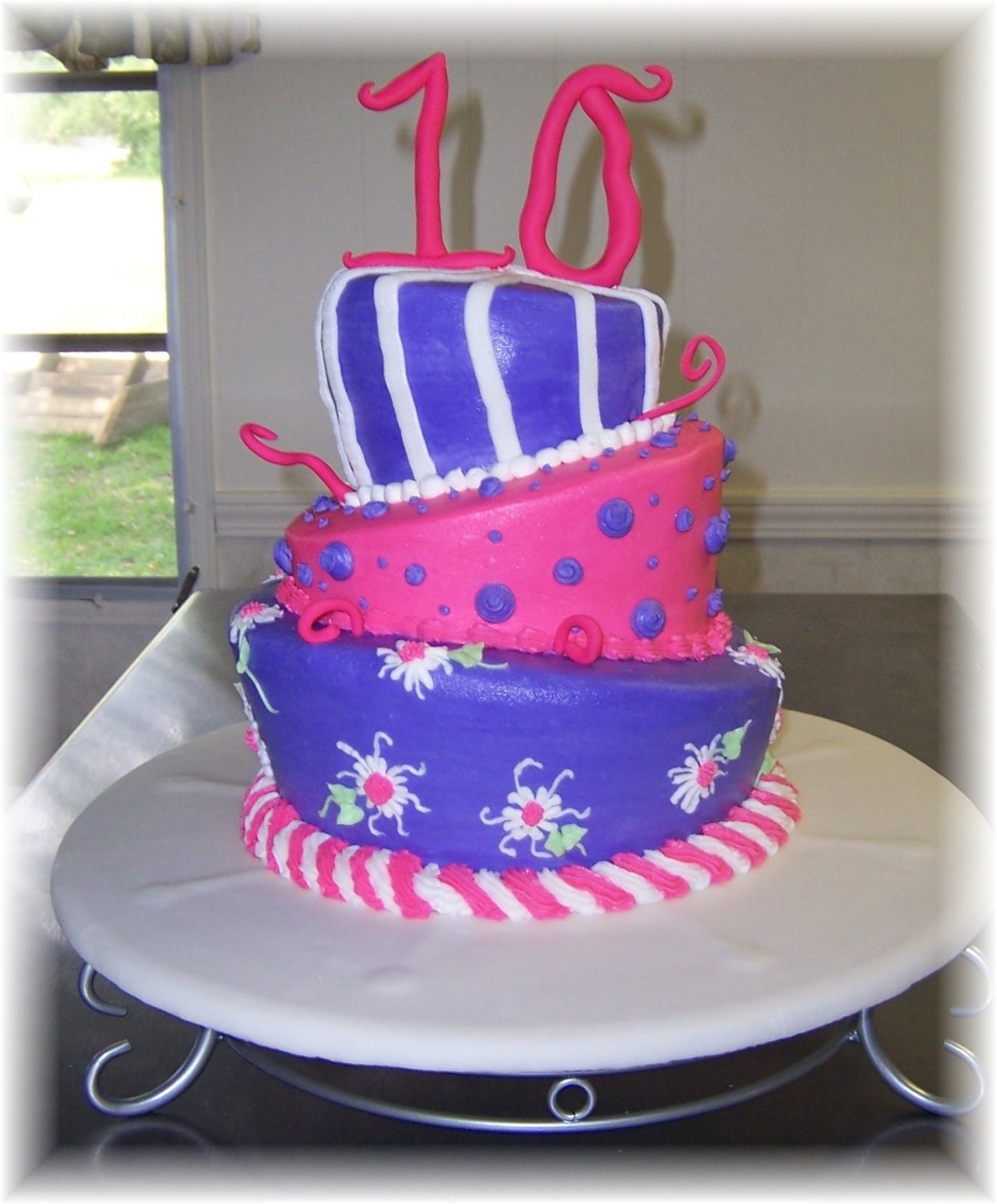 Topsey Turvey Birthday all buttercream except for the fondant numbers and curls