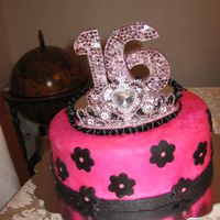 Meli's Sweet Sixteen This cake was made for my sister's sweet sixteen. It was a chocolate cake with choclate ganash. It was also my first attempt at...
