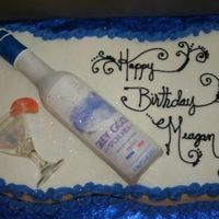 Vodka Cake I made the bottle out of fondant and put an edible image on it. The inside of this cake is tinted blue also.