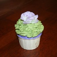 Lavender And Green Cupcake Close up view. The flower is non-edible.