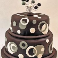 Jack & Jill Bridal Shower Chocolate fudge cake with lemon curd/lemon buttercream filling. Chocolate Satin Ice fondant. Fondant accents.