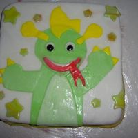 Baby Einstien Dragon I made this as a birthday cake for my daughter's first birthday. It's my first try with fondant.