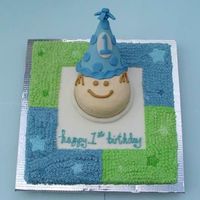 1St Birthday Boy! This was my son's first birthday cake. It was a duplication of the theme for the party. The cake is a 16" square with a 6"...