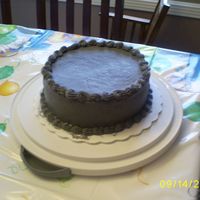 Grape Colored Cake This was a disaster from the get go...15 minutes after I put the cake in the oven our electricity went out....for over an hour. So this...