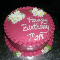 Bettys Bday 8" Choc cake with rasp filling. Iced in B/C, Fondant dasies. TFL!