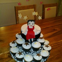 Betty Boop Cupcake Birthday Cake Birthday cake made for a friends daughter. The cupcakes are chocolate orange and lemon. The top is fruitcake graced by Betty Boop which is...