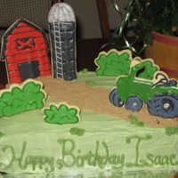 Isaac's Farm Birthday Color Flow covered sugar cookies decorate this farm themed cake for my nephew's birthday. A big hit with the kids-- can't beat...