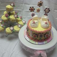 Buttons Baby Shower Lemon cake with lemon cream cheese frosting and fondant accents. Shoes are fondant with tylose added. So much fun to make!