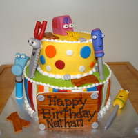 Handy Manny Cake Iced in buttercream with decorations in fondant.