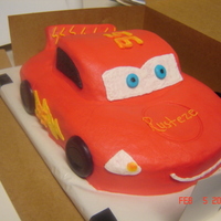 Lightening Mcqueen Super fun cake to do. Carved from a 9x13 and 2 loaf cakes. Client loved it. All buttercream but the wheels are chocolate. The fen is cake...