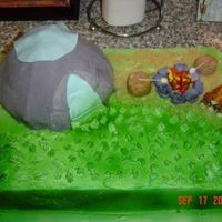 Camping Cake This cake was really fun... 1st time working w/ fondant at all... now i use it all the time... it is supposed to be a tent, with fire pit/...