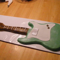 Guitar My 1st guitar... chocolate chip cake w/ buttercream & fondant. Was fun, not perfect, but think it came out pretty good.