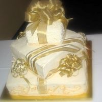 Wedding Gifts Buttercream with RI scrolls and fondant rope border.