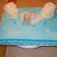 Peek A Boo Baby Boy Buttecream with buttercream bootie min cakes and fondant blanket