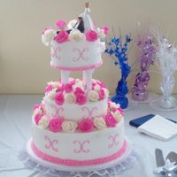 Pink Rose Cake Second wedding cake I have ever done. I need a lot of practice when it come to wedding cakes. Everyone liked it but me. I am my own worst...