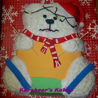 Skiing Birthday Bear Found this idea on wilton website. Made it for my DF boss to give to her daughter for her birthday. TFL