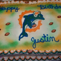 Miami Dolphins Made this for the boy down the street. Half white Half Chocolate. Did a piping gel transfer then piped it in. TFL.