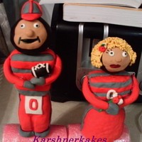 Mr And Mrs Brutus Buckeye Made out of rice cripsy treats and covered in fondant. Made for a couple that is renewing their wedding vows. Hope they like it. TFL!