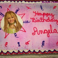 Hannah Montana Made this for my niece. She absolutely loved it. Couldn't get an edible image, so I improvised and cut a picture out of a coloring...