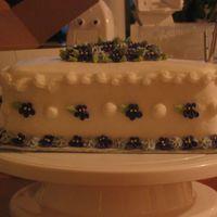 Violet Cake This is a cake that I made using some of the skills that I've learned in Wilton course two. I am going to give it to my sister for her...