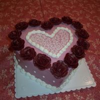 Contest_Cake.jpg Valentine's cake done just for the heck of it. Decorations are all buttercream and the cake is chocolate.