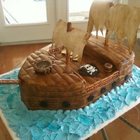 Pirate Ship Another last minute, rush. Chocolate cake, cookies n cream filling. Fondant covered, scored and painted with diluted brown coloring for...
