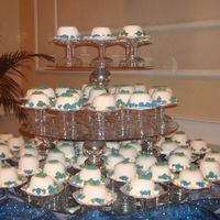 Minicakes15.jpg 175 mini cakes for a wed anniversary, we used two 60 inches round tables to placed them. it was a lot of work and stress, but at the end a...