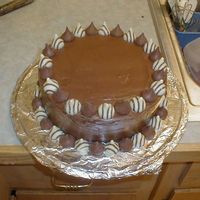 Hugz And Kisses Cake My 11 yr old son's teacher when he was in 2nd grade loved chocolate so I came up with this cake that was devils food layers with milk...