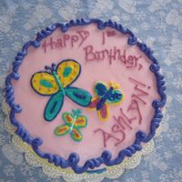 Butterflies 2 different colors. Side is yellow and top is pink..a litlle tricky but can be done. With medium size drop flowers on the sides.