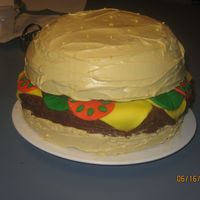Hamburger Cake This was my first attempt at making a special cake for Father's Day. Fondant was used for the cheese, pickles, and tomatoes. Chocolate...