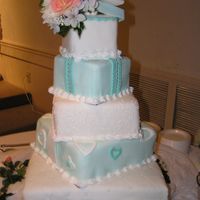 Tower Of Presents (Front) Tiffany Blue and white presents covered in fondant.