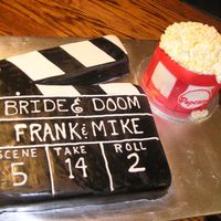 Clapboard And Bucket Of Popcorn My husband asked me to make these cakes for a movie premier. Thanks to all who helped me to envision and create these cakes. Both cakes are...