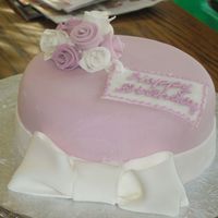 Almost A Bonnet Mauve and White Fondant over Buttercream. Ribbon Roses and Fondant Bow. This cake was made in a little over an hour and a half. This was my...